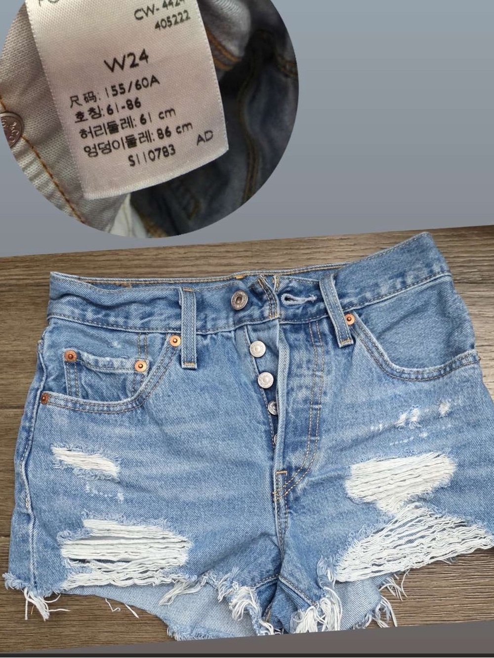 Levi's Light Blue Distressed Button-Fly Jean Shorts